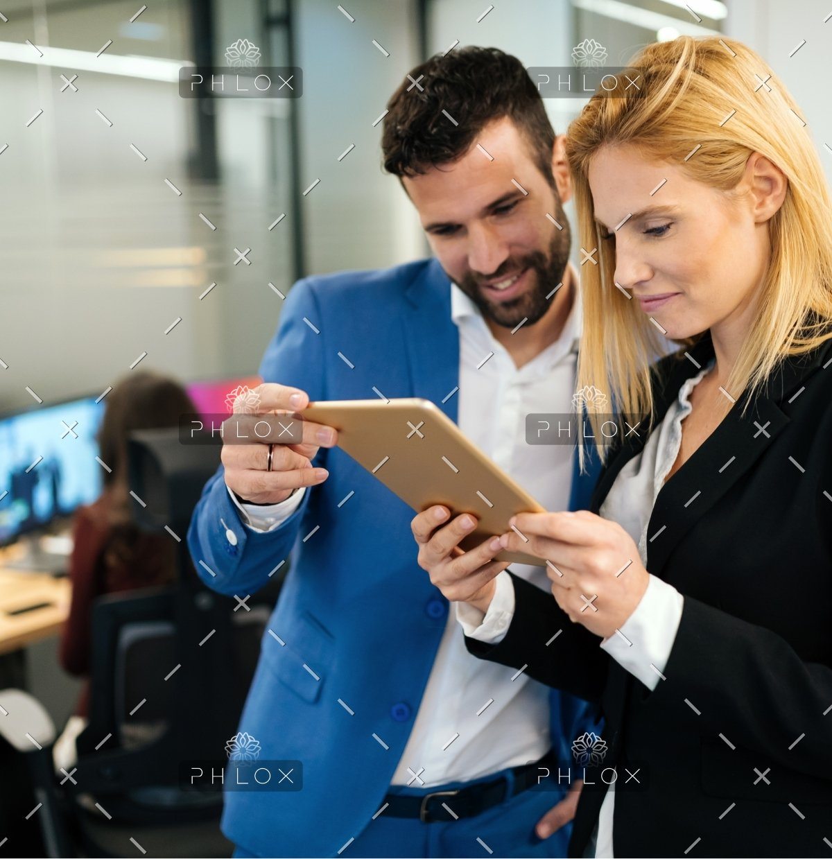 demo-attachment-35-businesspeople-discussing-while-using-digital-WFGVC3X